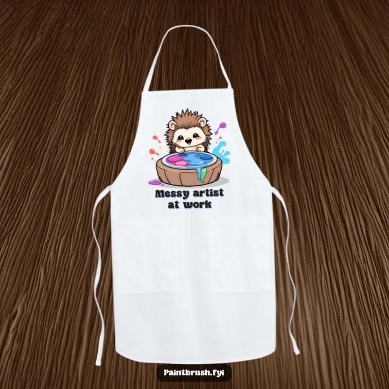 Funny apron featuring a playful hedgehog artist rolling in colorful paint palettes, ready to create masterpieces in the kitchen or studio.