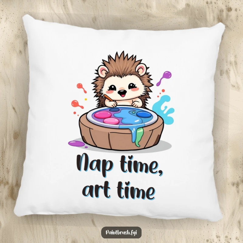 Funny pillow showcasing a happy hedgehog artist creating colorful art by rolling through vibrant paint palettes, adding comfort and cheer.