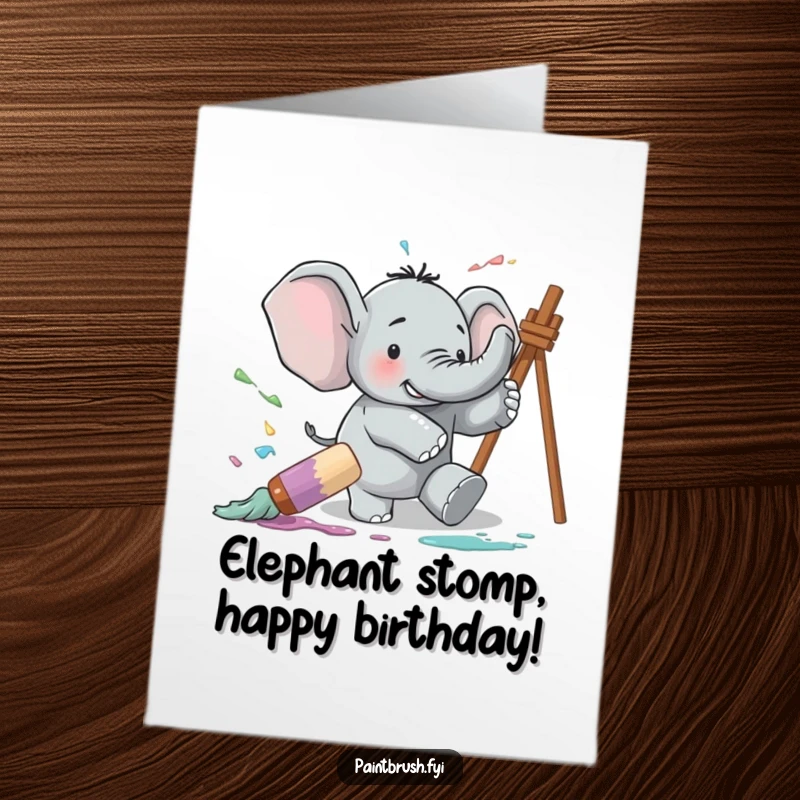Funny Free Printable Elephant Birthday Card: A clumsy elephant trips over a giant paintbrush, splattering paint everywhere.