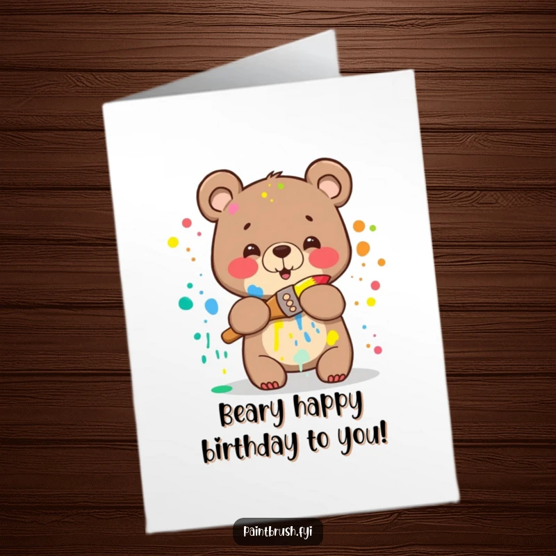 Funny Free Printable Birthday Card: A happy bear covered in rainbow paint hugging a paintbrush, celebrating birthdays with artistic abandon.