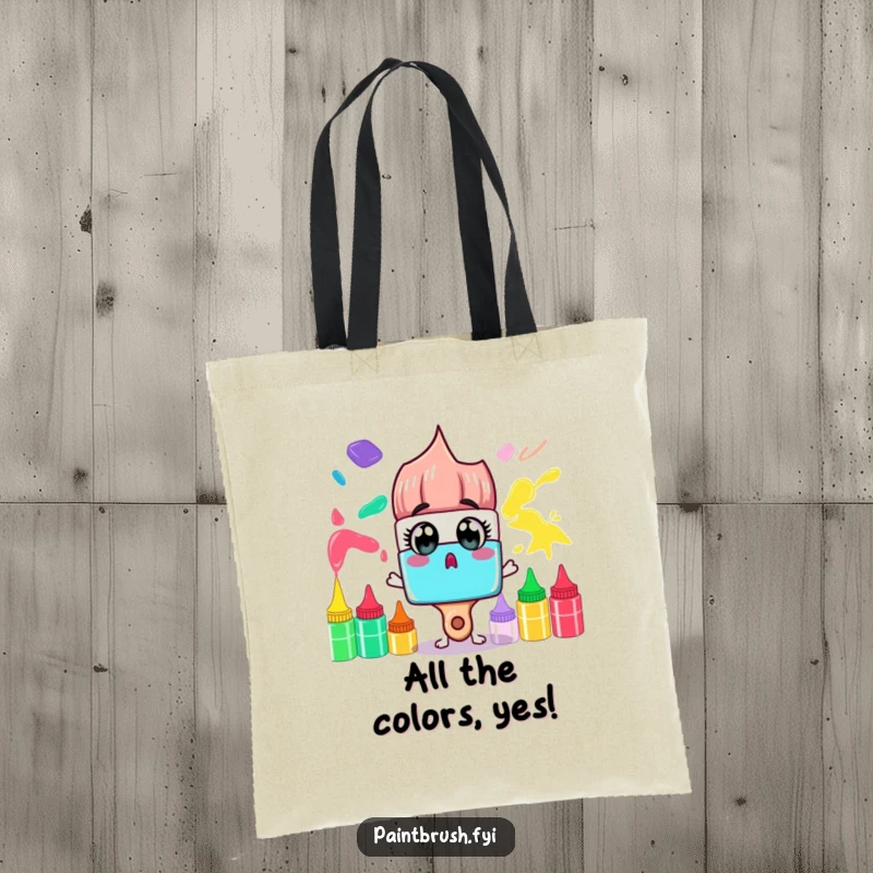 Funny Tote Bag: A surprised paintbrush character gazes at a rainbow of paint tubes, perfect for humorously carrying colorful art supplies.