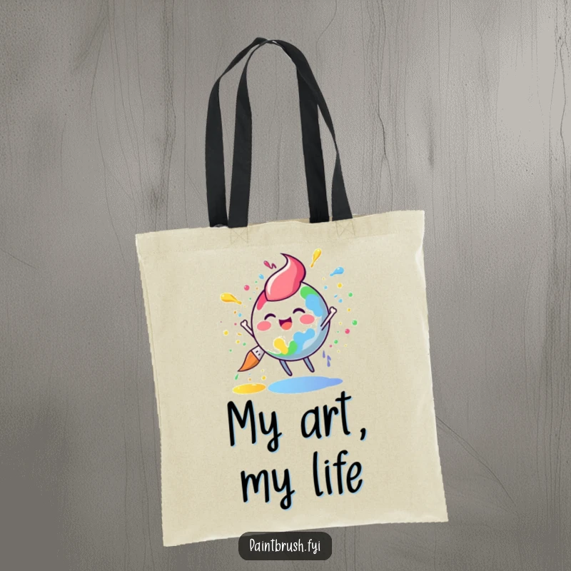 Funny paintbrush tote bag with a round character joyfully splattering rainbow paint, perfect for carrying art supplies with flair.
