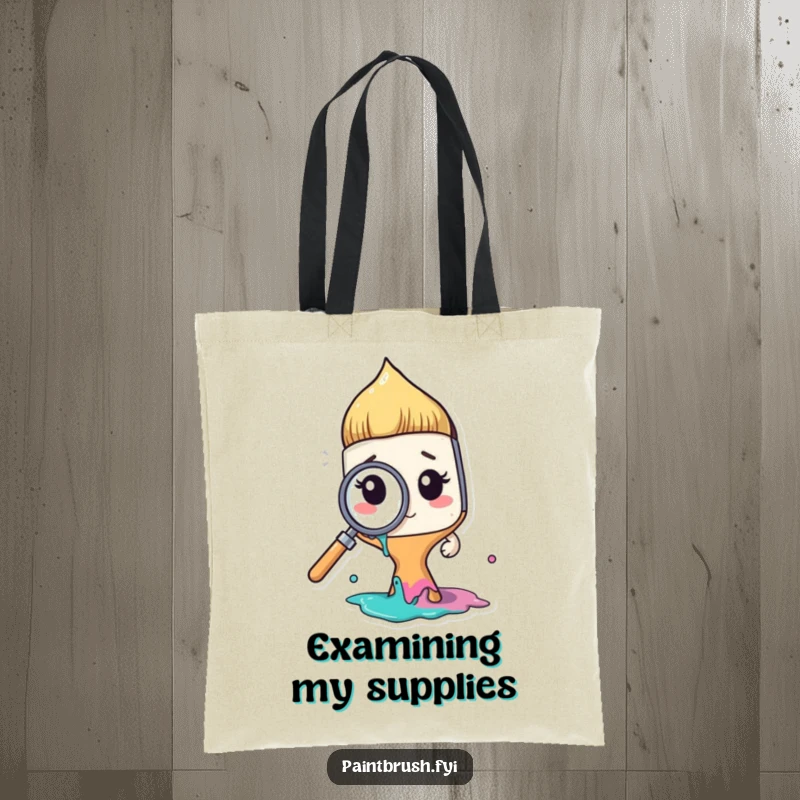 Funny paintbrush character examining paint with a magnifying glass, on a durable tote bag, a funny and practical art gift.